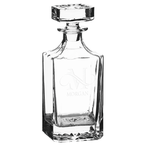 Clear square glass decanter with faceted base and embossed 'MORGAN' label