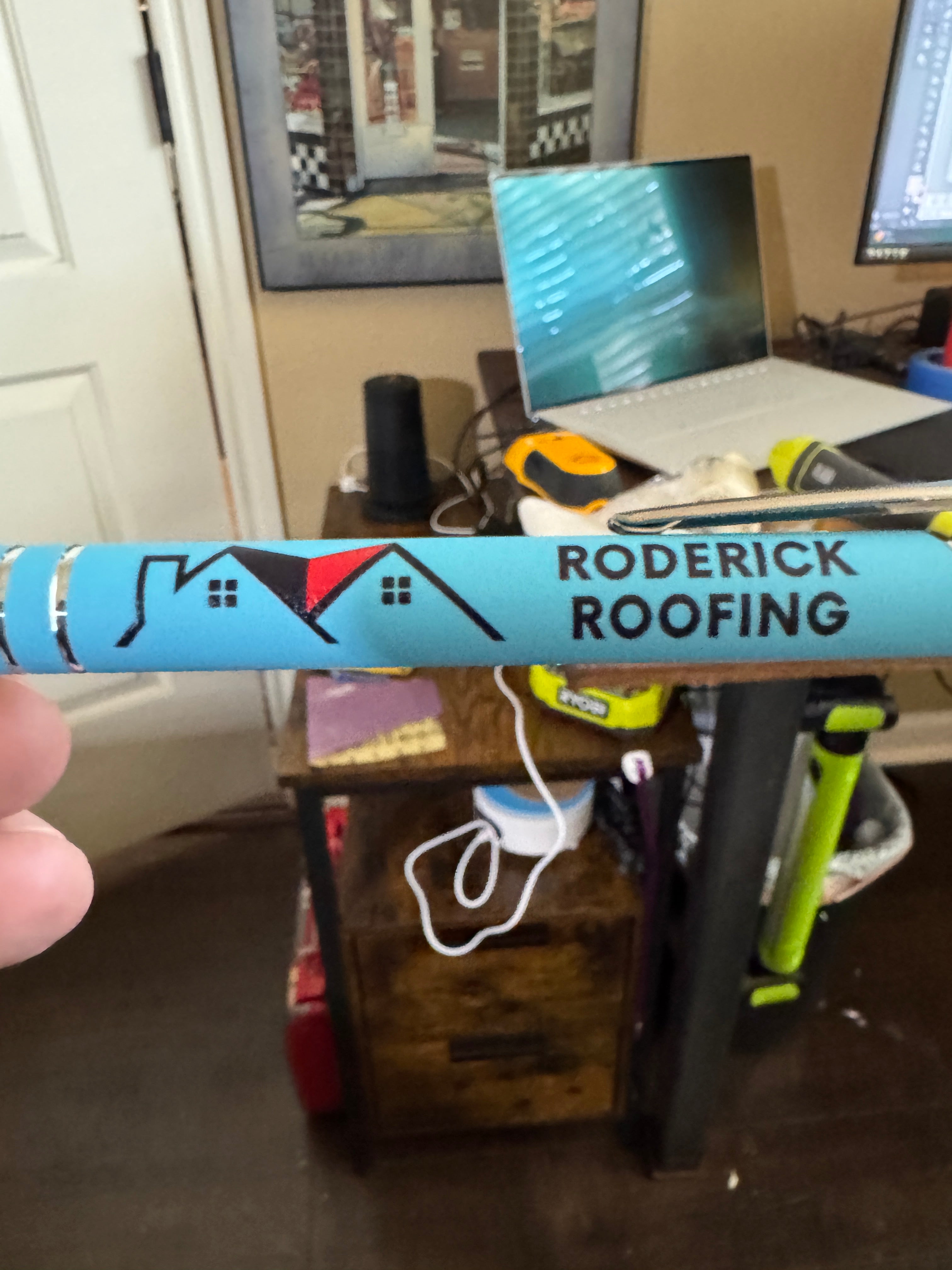 Roderick Roofing blue pen